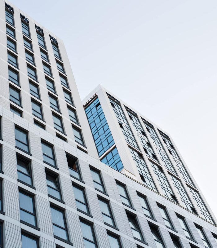 modern-glass-building-skyscrapers-of-business-cent-2021-08-28-07-46-44-utc-min-min-min